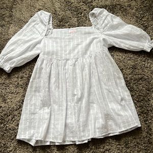 White mini dress with puff sleeves. Brand new, worn once